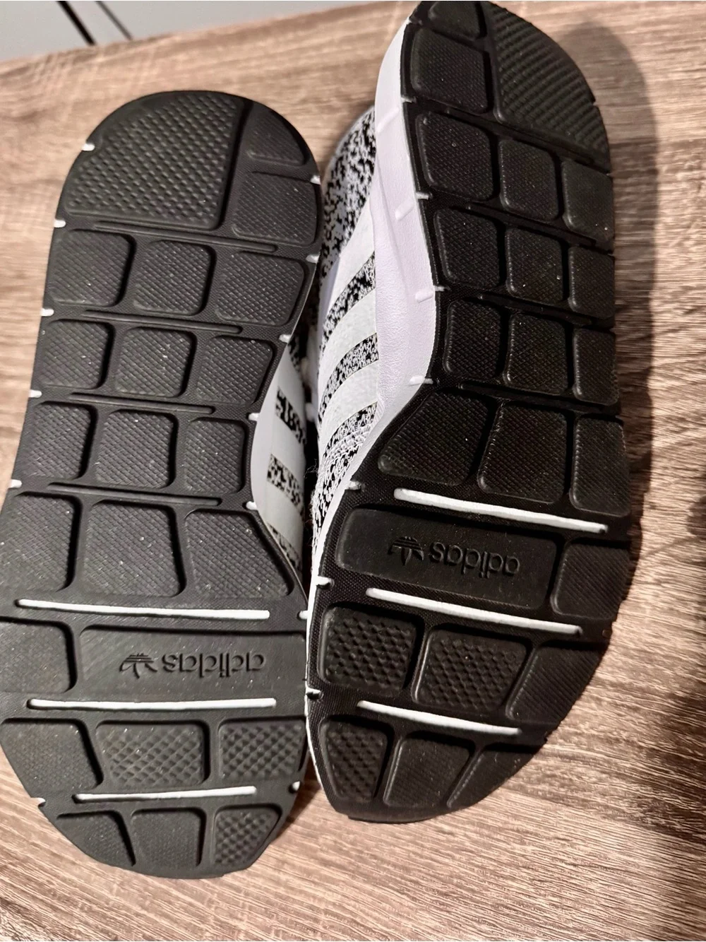 Adidas women’s white and Black Knit Sneaker